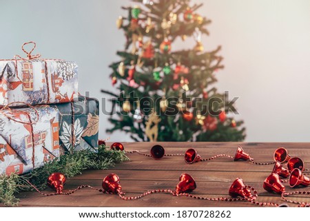 Christmas concept, New Year gifts, decorations. Christmas background with tree and decoration on wooden board