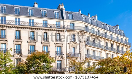 Paris, typical facades and street, beautiful buildings at Republique