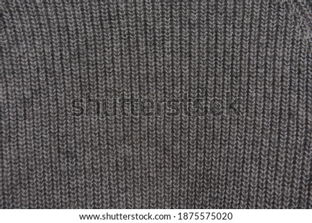 Warm gray knitted sweater textile