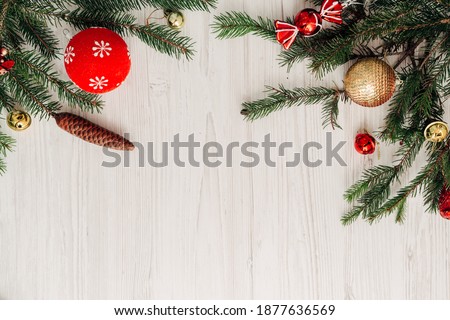 Christmas Composition on a White Wooden Table with Copy Space
