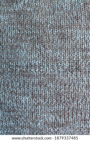 Goat wool knitted fabric, plain knitting, hand knit, vertical photo