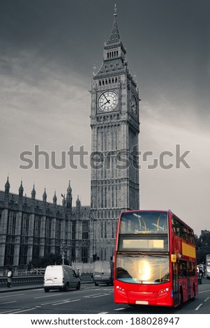 Double-deck red bus on Westminster Bridge with Big Ben in London.