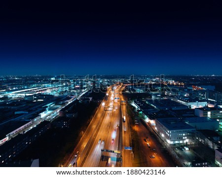 Night flight over Berlin, the lights of the Urban