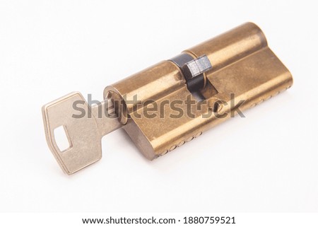 key and padlock on white background
