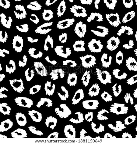 Black and white leo seamless pattern. Random placed animal all over print as all over.