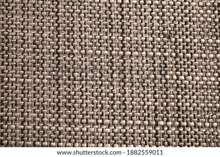 Closeup of gray textile fabric, pattern background. Upholstery.