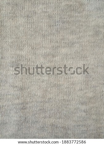 Gray knitting wool pattern background and texture 