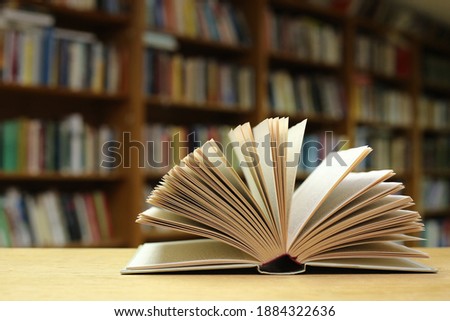 Open Book on the table in library