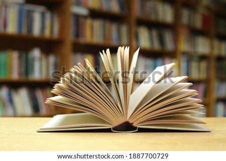 Open Book on the table in library