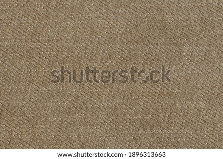 Texture of brown fabric for clothing.