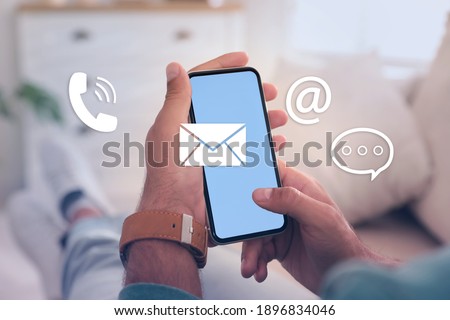 Hotline service. Man with smartphone indoors and different icons, closeup