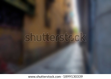 Blurred background of Barcelona narrow street. 