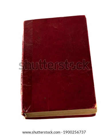 Old vintage book with a red cover isolated on a white background