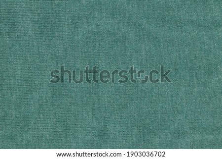 Green fabric texture for clothes.