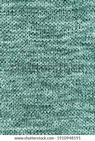 Knitted Fabric Texture. Textile texture off grey melange background. Detailed warm yarn background.Natural woolen fabric, sweater fragment.Melange structure of fabric. Grunge textile background.