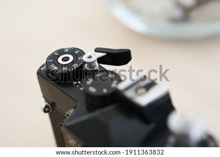 Old analog photograph machine with lens