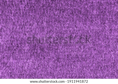 Texture purple velvet fabric close up. Purple background
