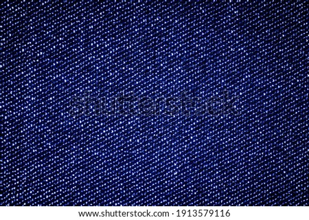 Bright blue, turquoise, azure fabric with metallic silver thread. Texture, background,