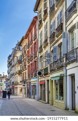 Street with historical houses in Bayonne city center, France