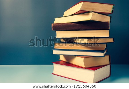 a composition of many hardcover books, a concept of reading and education, copy space