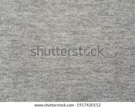 Gray knitting wool pattern background and texture

