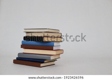 _Stack of books on white background