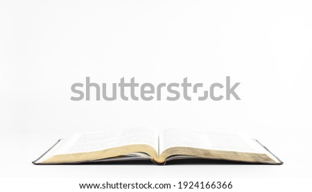Open book holy bible on a white background. Scripture