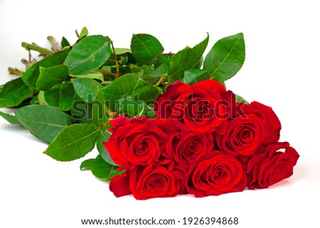  bouquet of red roses on the white