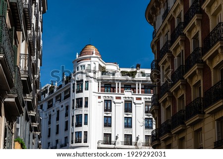 Old luxury residential buildings with balconies in historic centre of Madrid. Concept rent regulation