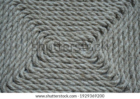texture of a rope lined with a beautiful pattern, handmade