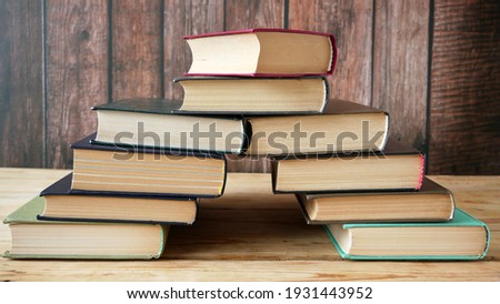 many books pile, library concept, books shop, closeup