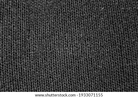 Image of black and white fabric background of woolen look