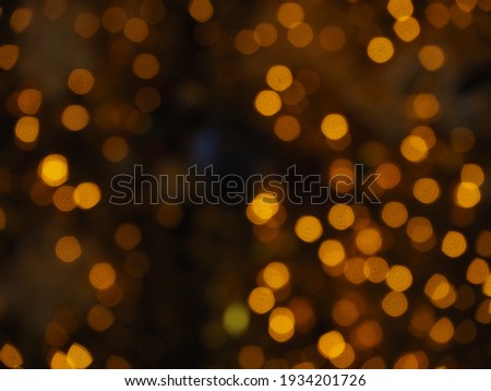 Orange bokeh lights at night