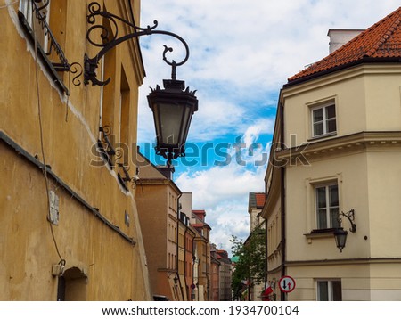 Lantern on an old street in Warsaw, Poland