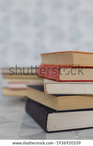Stack of books on white background