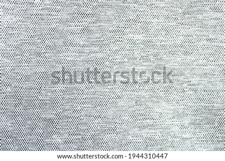 Woven fabric texture for using as abstract backgrounds, white and black dots