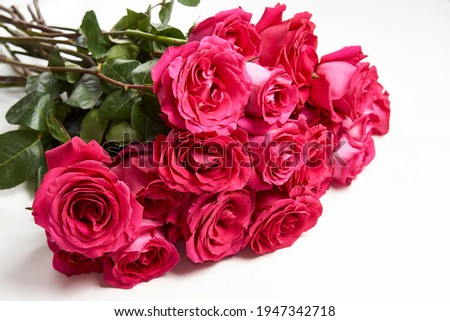 Bouquet of pink roses on white background with copy space. Beautiful red rose bouquet flower. Valentines day flowers