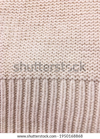 Knitted texture background. Knitting pattern of wool. Knitting

