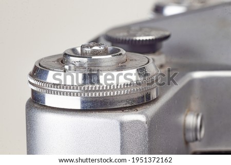 Controls of an old film SLR camera. Close-up. Soft focus