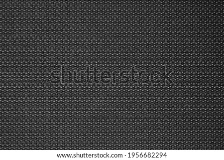 Black stitched plastic fiber background material