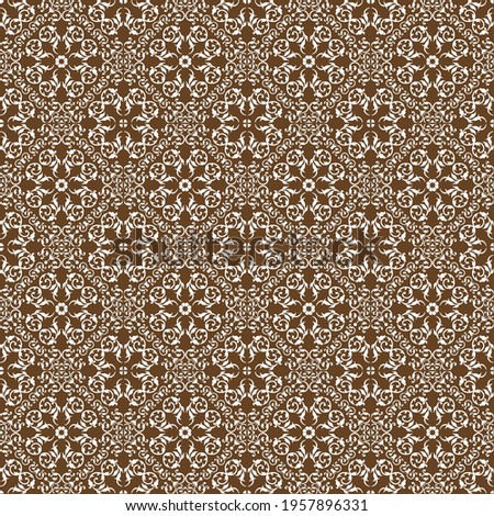 white pattern with a complex ornament on a brown background