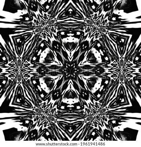 Monochrome ornamental symmetrical abstract kaleidoscopic background design