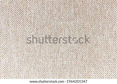 The fabric is beige.Background, fabric texture.