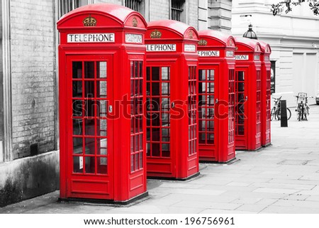 row of traditional phone boxes in London city in a chroma key processing