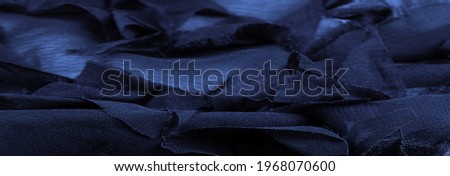 Texture. Background. blue silk fabric, top view. Smooth elegant blue silk or satin fabric texture can be used as an abstract background with copy space.
