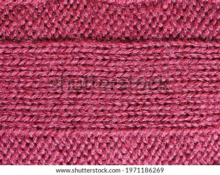 purple red wool texture useful as a background
