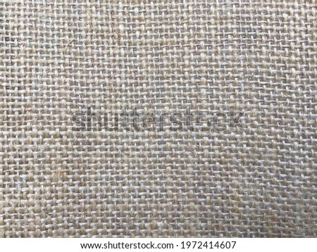 Closeup pattern of jute linens using background.