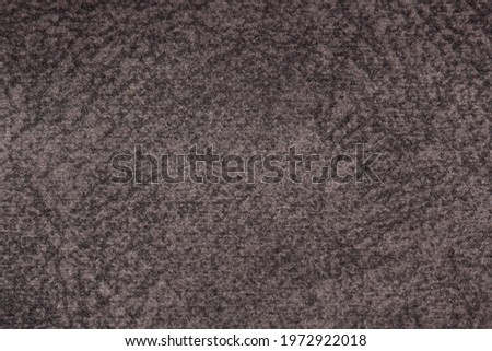 the texture of soft furniture velour with a dense pile
