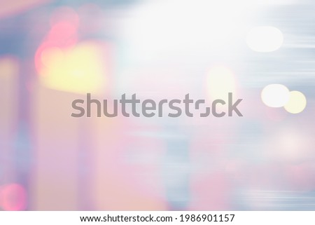 BLURRED OFFICE BACKGROUND, MODERN LIGHT INTERIOR WITH BOKEH AND MOTION LIGHTS REFLECTIONS IN THE WINDOW 