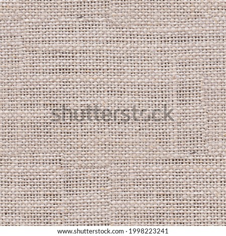 Light beige linen canvas texture for new project work. Seamless pattern background.